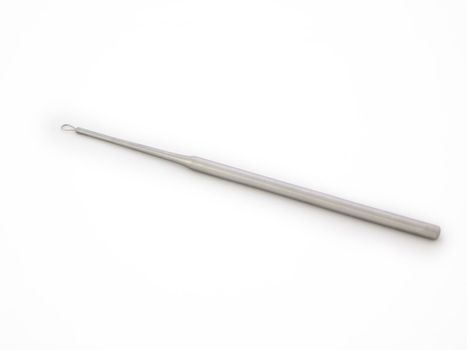 A cerumen curette isolated on a white background. It is a medical instrument used by the ENT specialist to remove ear wax.