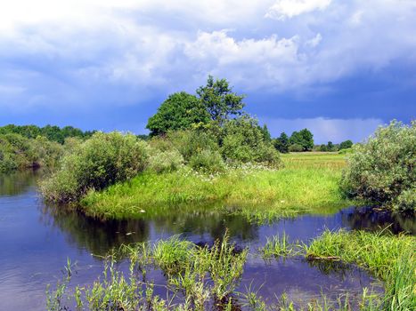small river before thunderstorm