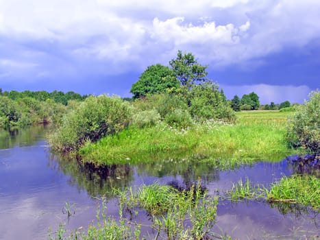 small river before thunderstorm