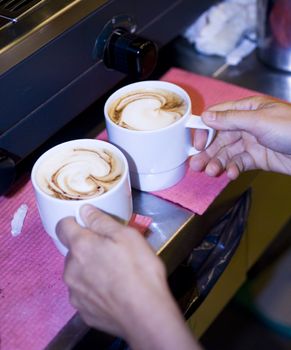 a classic morning cappucino for breakfast served at the bar