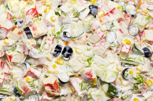 mixed salad with white dressing, with big spoon, suitable for background