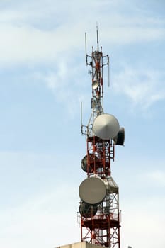 communication tower on a bright sunny day
