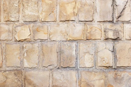 Large limestone bricks wall grunge background