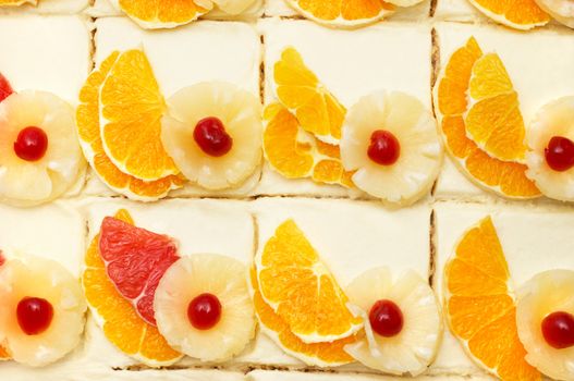 many fruit cakes with custard. suitable as background.