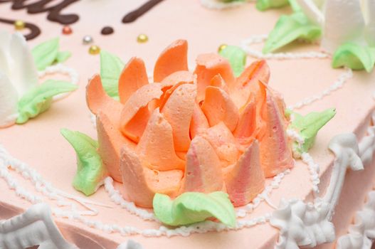 multi-colored florish cream decoration on cake