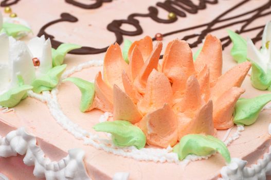 flourish multi-colored cream decoration on cake