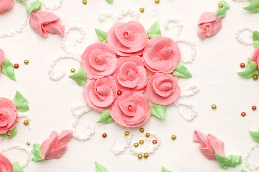 creamy cake decorated with roses. suitable as background.