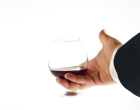Hand with glass of wine on white background. Isolated object.