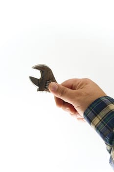 Hand with wrench on white background. Isolated object.