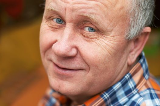 Casual bald senior man emotional portrait series.