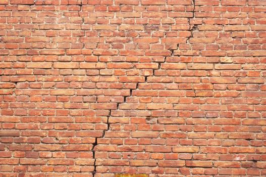 cracked red brick wall texture. grunge background.