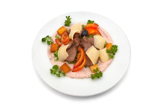 Veal salad with sliced fresh tomato, parmesan chips and cracker pieces, dressed with rose sauce and parsley