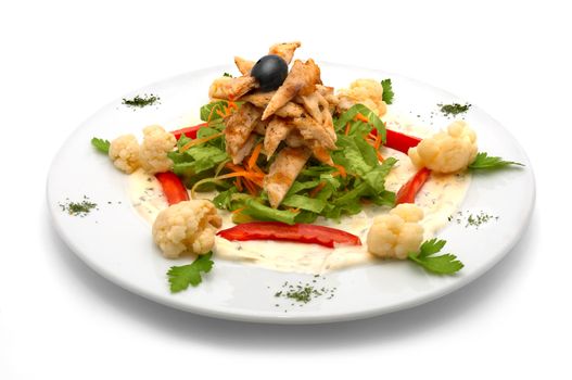 caesar salad with lettuce, chicken meat, red pepper, cauliflower, carrot and one black olive