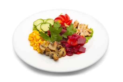mixed salad with sweet corn, cucumber, red beet, chicken meat and fresh tomatos
