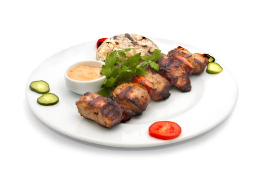 shish kebab with rice and mushrooms