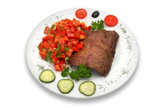 Grilled veal fillet with vegetable salad.