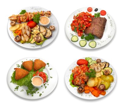 4 dishes of delicoius food. Grilled meat and vegetables. Isolated on white. This image was composed using 4 different shots.