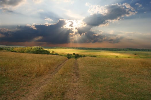 summer rural landscape with dramatic clouds