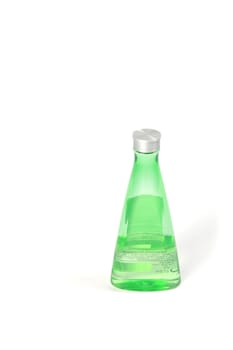 Green jar with medical cosmetics on a white background