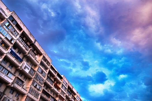 residental building and evening skies before the storm