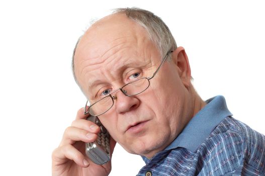 Bald senior man talking on the phone. Isolated on white.