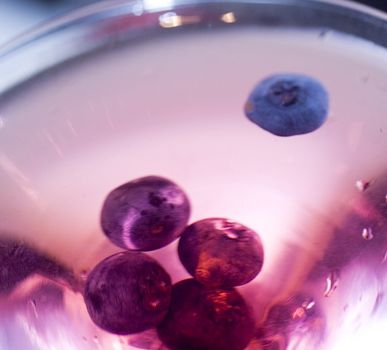 close up shot of a blueberry dry cocktail