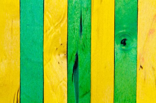 vertical arrangement of green and yellow wood in landscape orientation