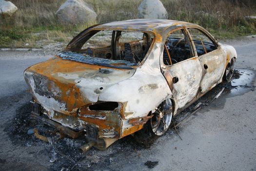 Burnt-out car after car theft.