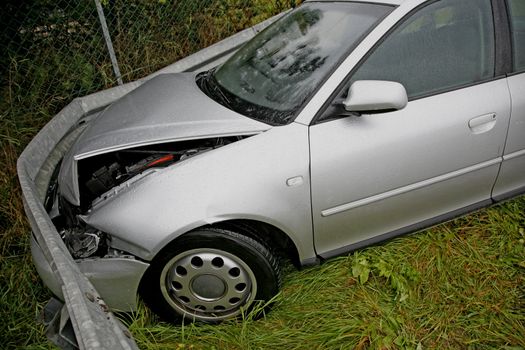 Front of new car after a car crash. Drunken driving?