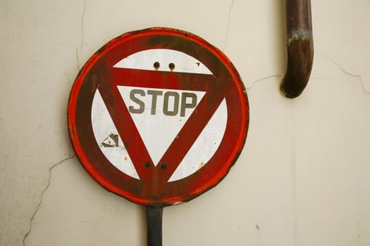 Full stop sign in decay.