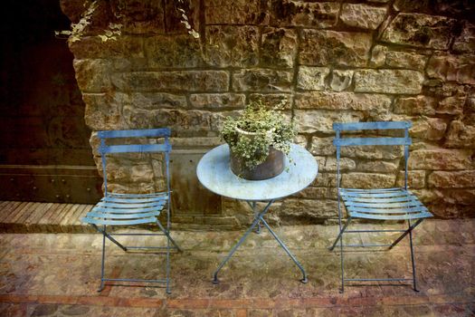 Artistic work of my own in retro style - Postcard from Italy. - Alley with table for two, Spello, Umbria, Italy