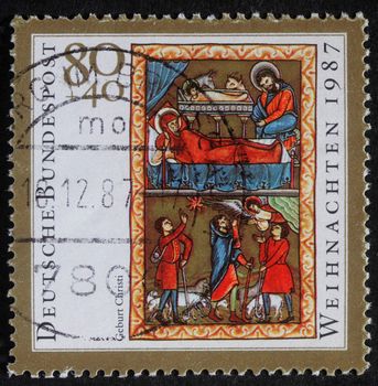 GERMANY - CIRCA 1987: A greeting Christmas stamp printed in the Germany shows birth of Jesus Christ, adoration of the Shepherds