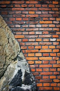 Grungy background of brick and rock wall