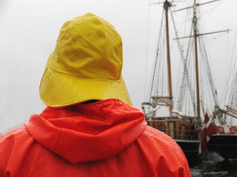 Sailor in heavy rain.