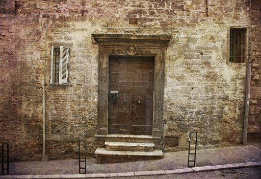 Postcard from Italy. Entrance at steep alley Perugia - Umbria, Italy. Several of my photos worked together to make a retro - dreamlike look.