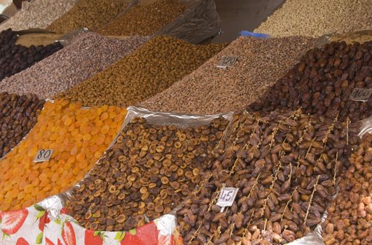 Dried fruit for sale on a market stall in the main souk in Marrakesh, Morocco.