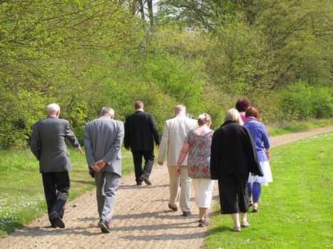 Family walking in the park at springtime - Denmark.