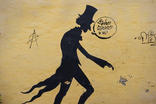 Graffiti caricature of Hans Christian Andersen (1805 - 1875) on urban wall near his museum in Odense, Denmark.