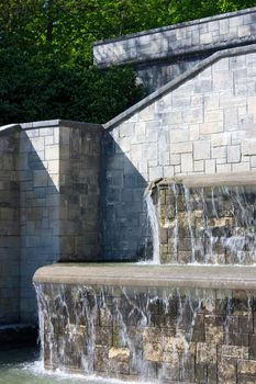 Foutains with water flowing in a nice park in France