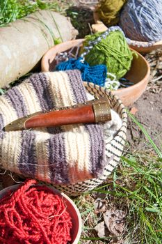 Work of wool with colorful balls and handmade hat
