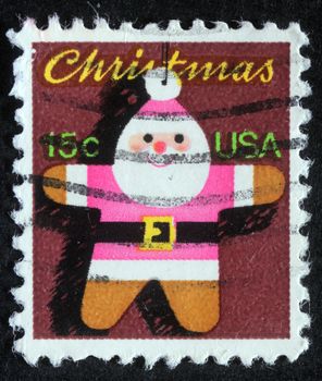 UNITED STATES OF AMERICA - CIRCA 1980: A greeting Christmas stamp printed in USA showing santa Claus