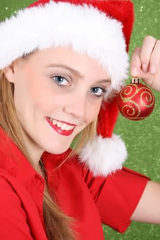 Teenager with red lips wearing a christmas hat