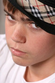 Teenage boy wearing a black hat in casual wear