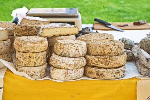 Italian traditional cheese on display at farmer's market