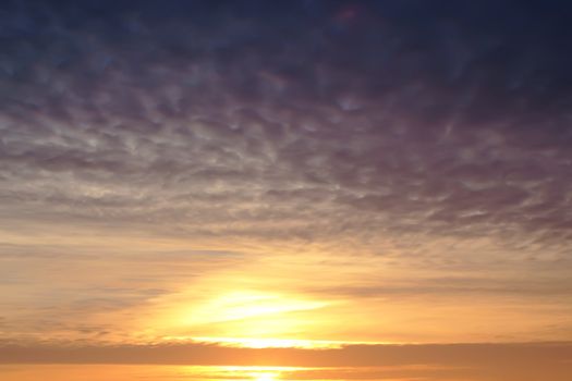 Sky with cirrus clouds in the sunset