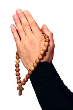 Wooden rosary with a cross hanging on his arms