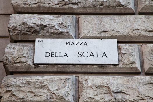 Street sign of famous interesting point in Milan center - Italy