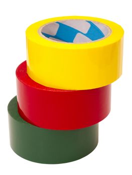 a stack of colored tape in large rolls