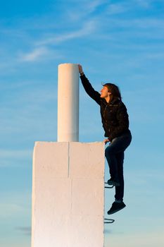 Ambitious teenager about to reach the top, a success concept