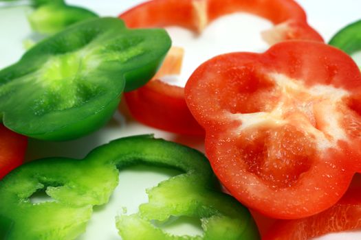 background of sliced red and green pepper
